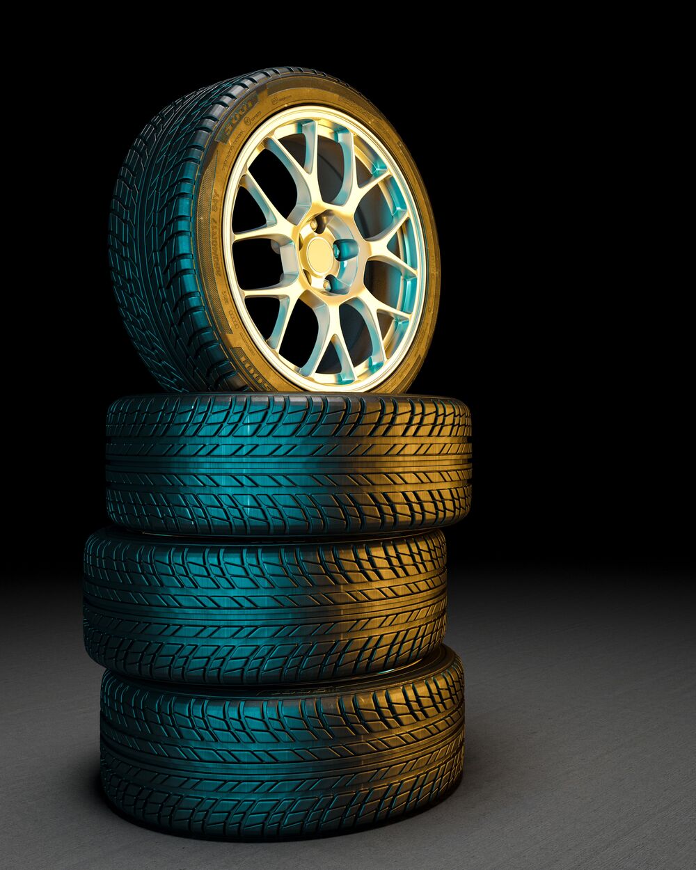 Stack of new tyres with alloy wheel